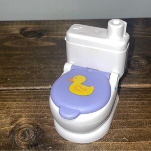 Mattel Barbie Toilet With Toilet Paper Roll button to pretend flush